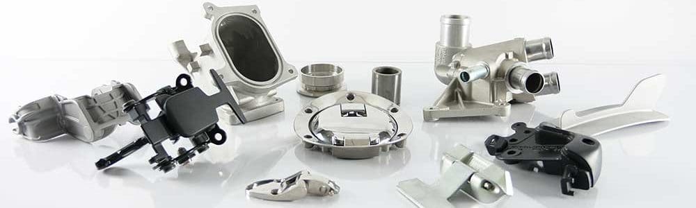 collage of investment cast parts from a variety of metal alloys