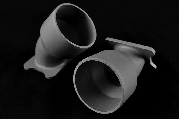 Inconel nickel investment cast parts on a black background