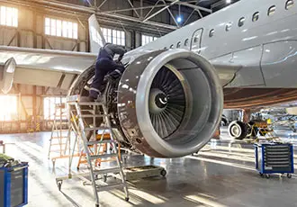 Close up of airplane wing and engine