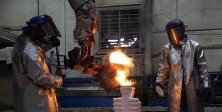 Hot metal being poured into a cast