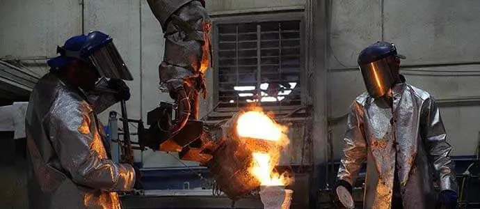 Hot metal being poured into a cast