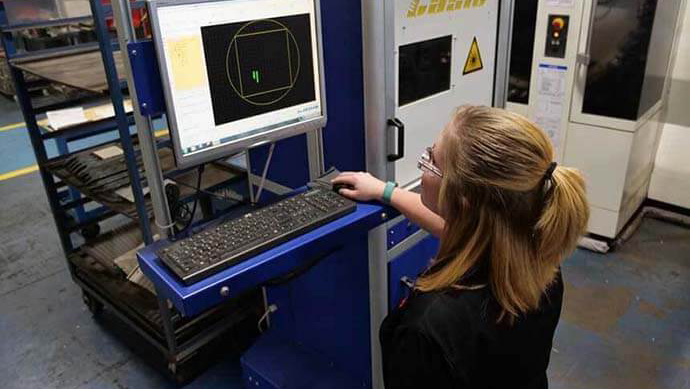 Barron employee working on computer