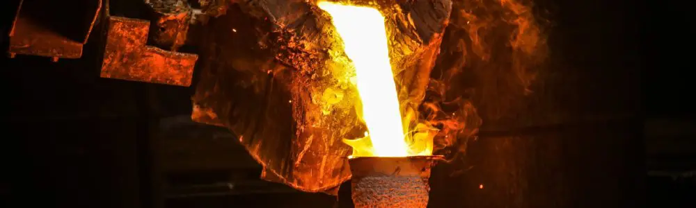 molten metal being poured into a ceramic mold