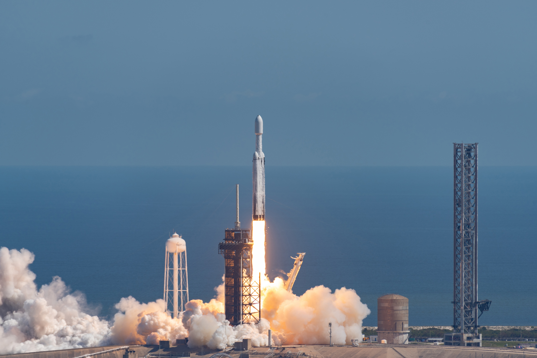 October 14, 2024: SpaceX's Falcon Heavy is seen from the roof of NASA's Vehicle Assembly Building launching the Europa Clipper spacecraft at 12:06 P.M. Credit: Brandon Moser/Central Florida Public Media