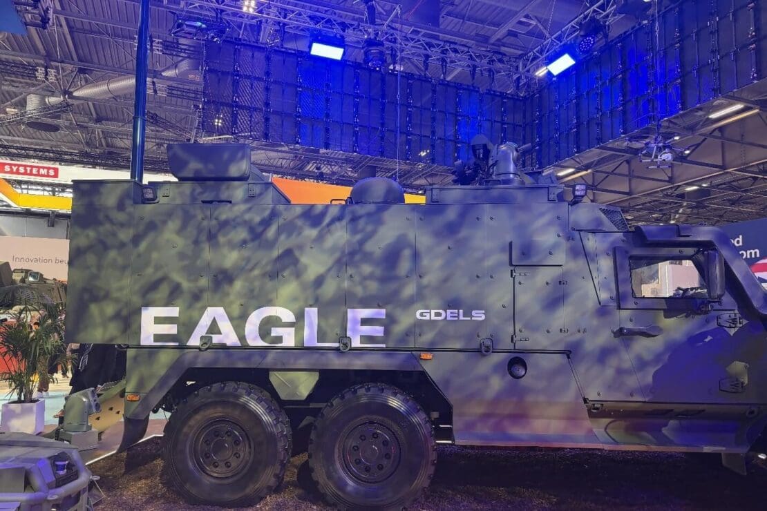 Large, six-wheeled armored military vehicle labeled EAGLE GDELS displayed at the Eurosatory 2026 exhibition.